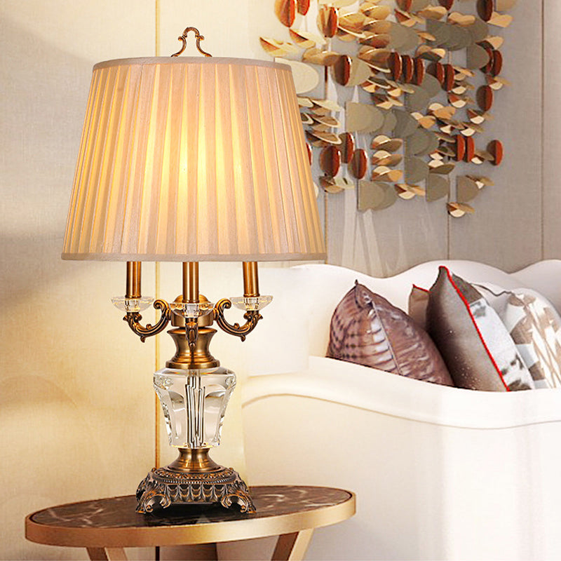 Modern Beige Fabric Pleated Desk Lamp With Bronze Sculpted Metal Base - 1 Bulb