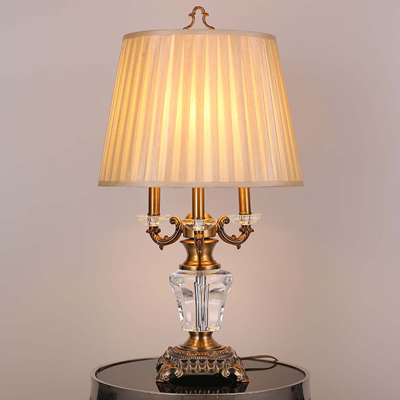 Modern Beige Fabric Pleated Desk Lamp With Bronze Sculpted Metal Base - 1 Bulb