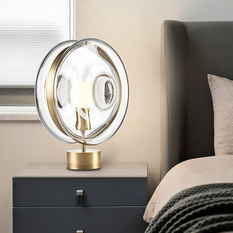 Minimalist Gold Metal Round Nightstand Lamp With Clear Glass Shade