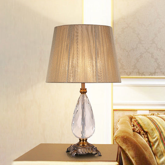 Modern Beige Table Lamp With Flared Wide Base And Fabric Shade