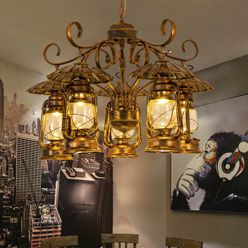 Village Style Metal And Clear Glass 5-Light Aged Brass Lantern Chandelier