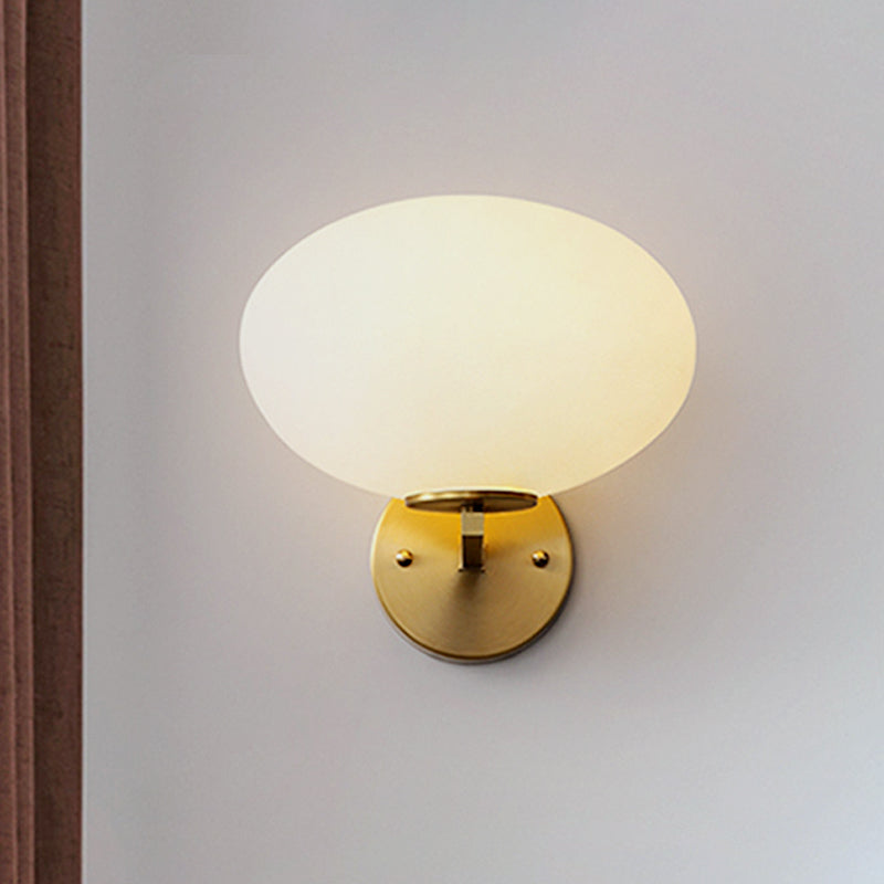 Modern Milk Glass Wall Sconce With Brass Finish