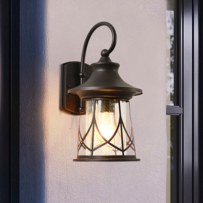 Industrial Porch Sconce With Seeded Glass Lantern Shade And One Bulb