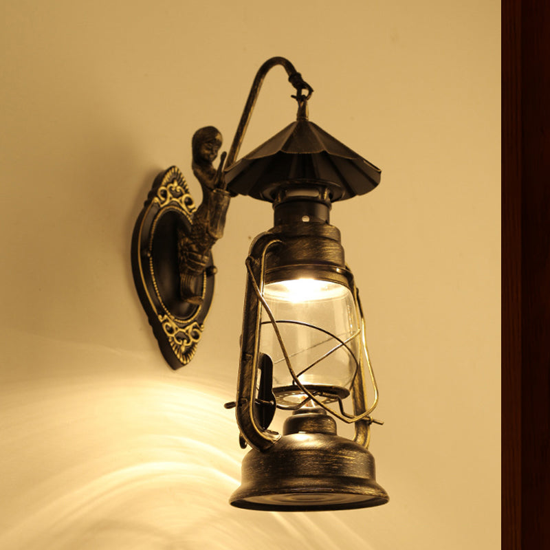 Coastal Single Bulb Kerosene Glass Wall Sconce In Black/Antique Brass For Living Room