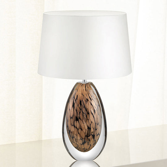 Modernist White Fabric Desk Lamp With Teardrop Brown Glazed Crystal Base - 1 Head Tapered Table