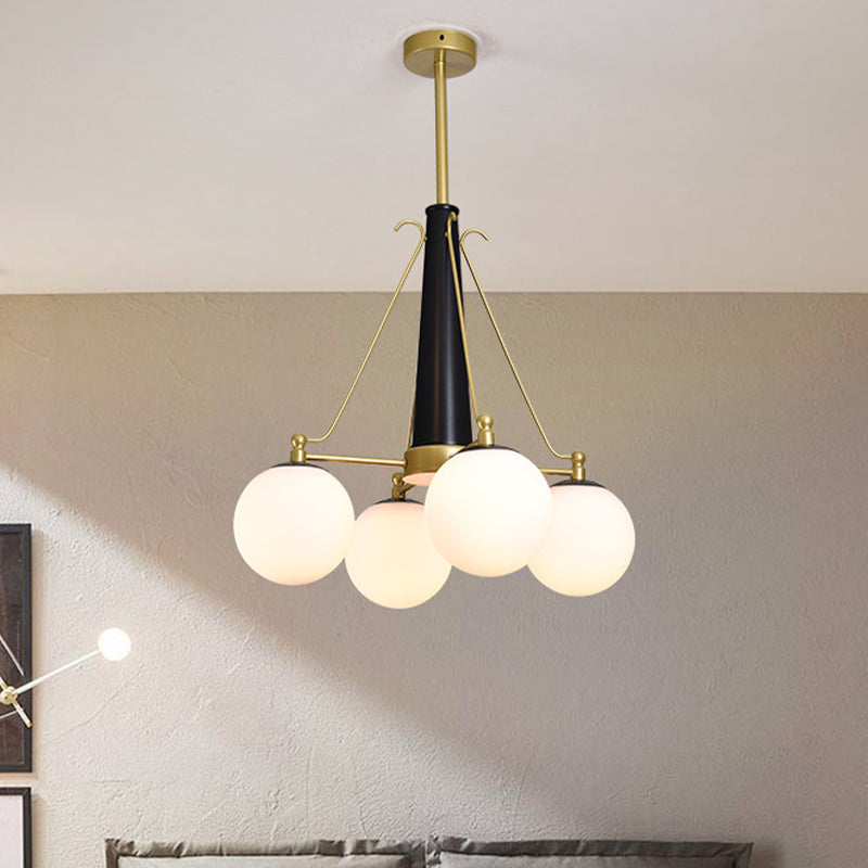 Modern Frosted White Glass Pendant Chandelier With 4 Brass And Black Hanging Heads