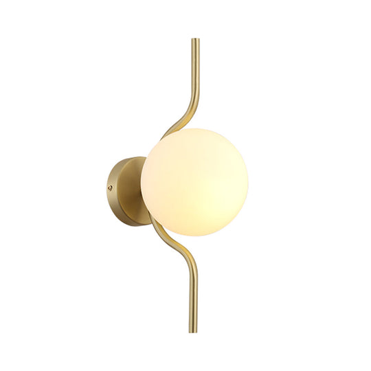 Globe White Glass Wall Mount Sconce Light With Elegant Gold Arm And Base