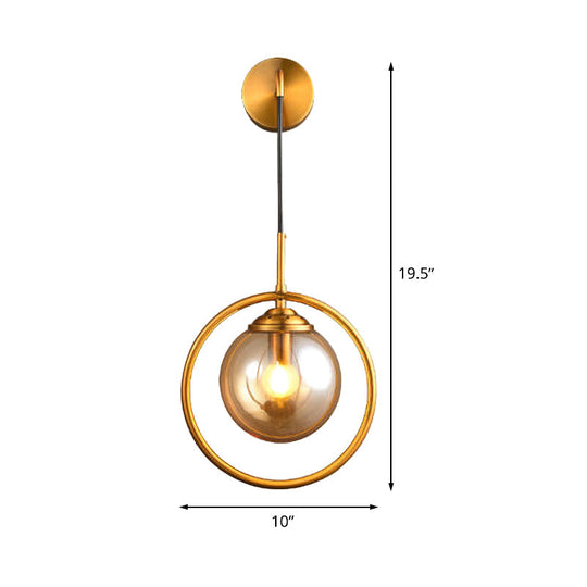 Modern Brass Wall Sconce With Glass Sphere Shade For Bedside Lighting