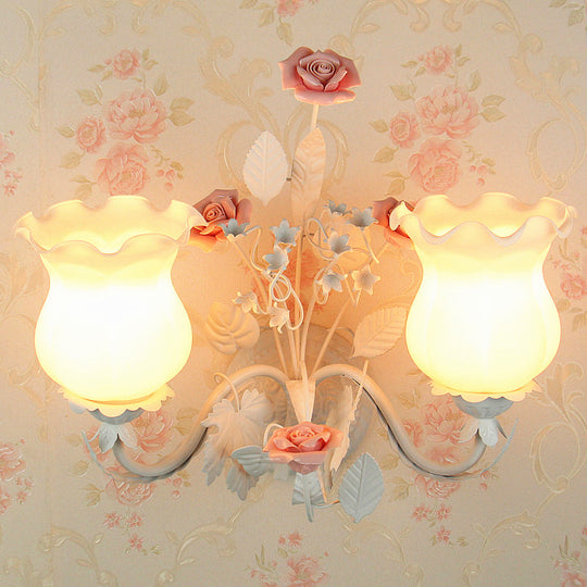 Pastoral Metal Curvy Arm Bedroom Sconce Light: 2-Head Flower Wall Lighting Fixture