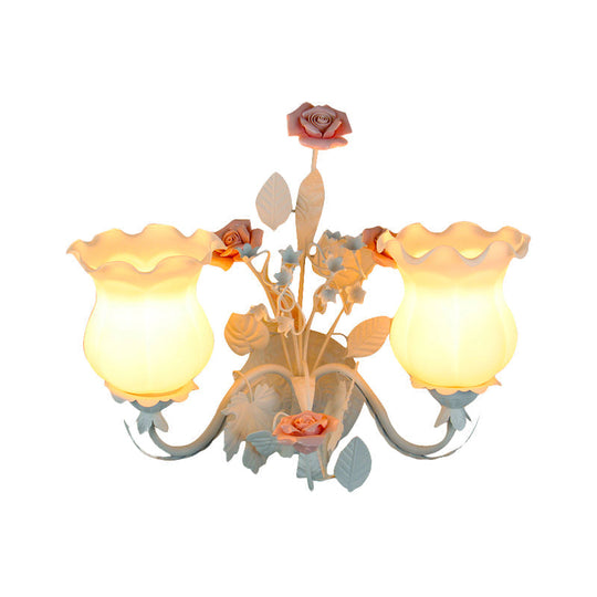 Pastoral Metal Curvy Arm Bedroom Sconce Light: 2-Head Flower Wall Lighting Fixture