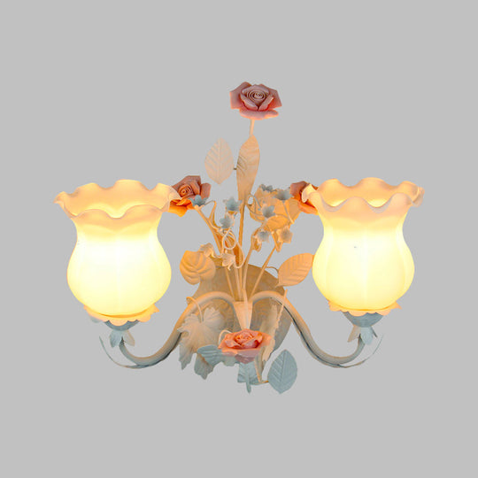 Pastoral Metal Curvy Arm Bedroom Sconce Light: 2-Head Flower Wall Lighting Fixture