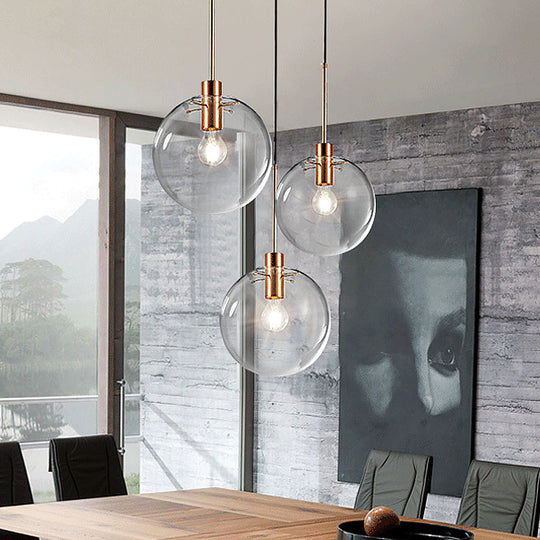 Minimalist Rose Gold Cluster Pendant With Clear Glass For Ceiling - 3-Bulb Fixture