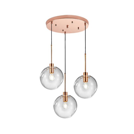 Minimalist Rose Gold Cluster Pendant With Clear Glass For Ceiling - 3-Bulb Fixture