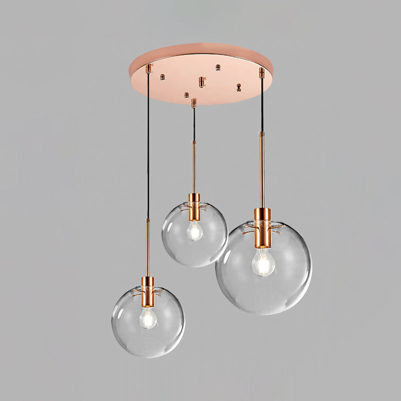 Minimalist Rose Gold Cluster Pendant With Clear Glass For Ceiling - 3-Bulb Fixture