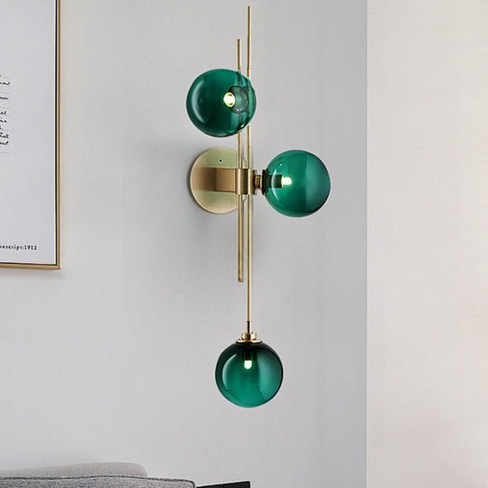 Contemporary Green/Clear Glass Globe Wall Sconce Lamp With 3 Lights In Brass