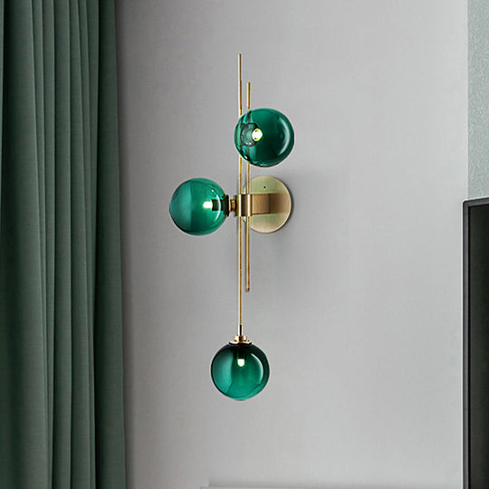 Contemporary Green/Clear Glass Globe Wall Sconce Lamp With 3 Lights In Brass