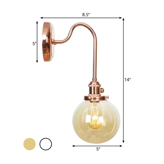 Copper Vintage Globe Wall Sconce With Curved Arm And Clear/Amber Glass - 1 Light