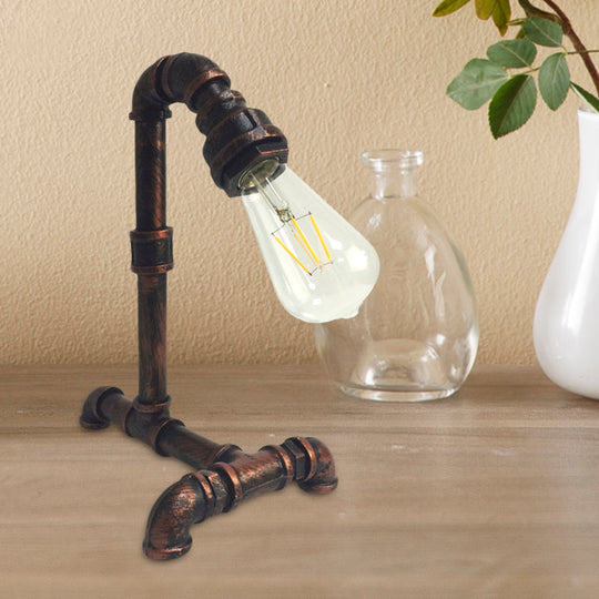 Vintage Rust/Black Metal Arm Night Table Plug-In Lamp With Exposed Bulb