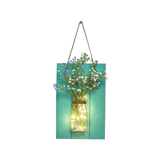 Clear Bottle Wall Sconce With Led And Rustic Teal Plant Decoration