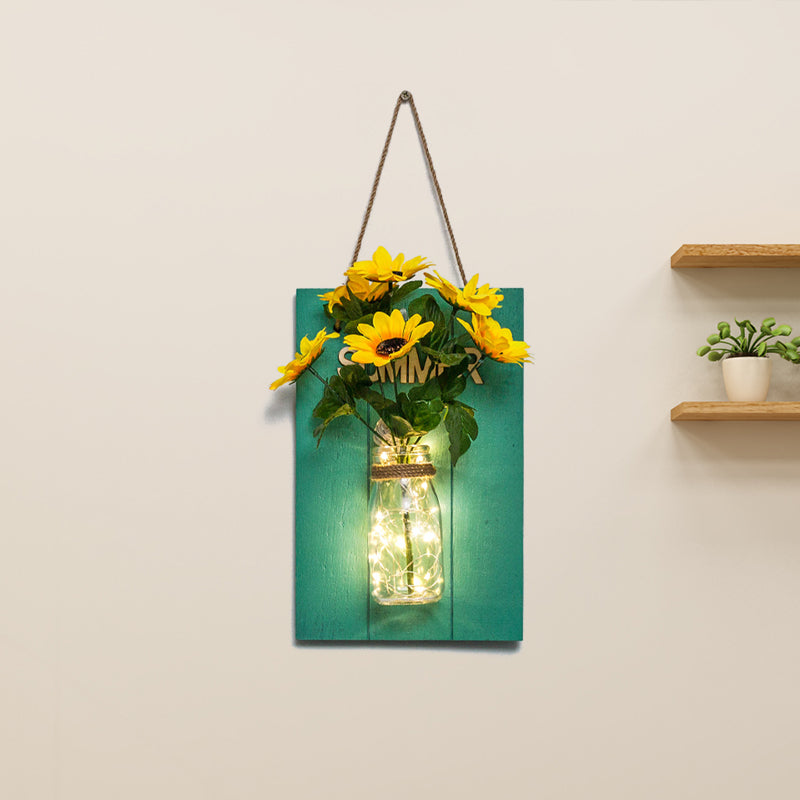 Clear Bottle Wall Sconce With Led And Rustic Teal Plant Decoration