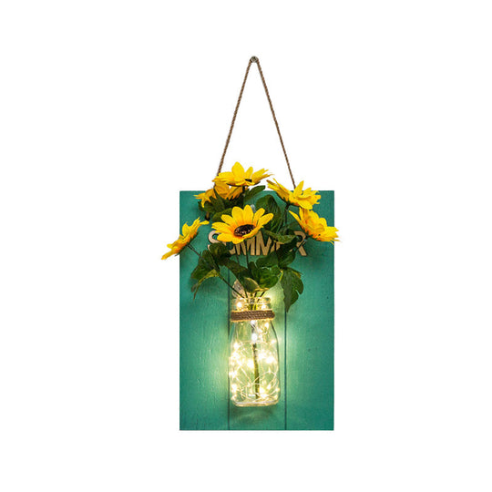 Clear Bottle Wall Sconce With Led And Rustic Teal Plant Decoration