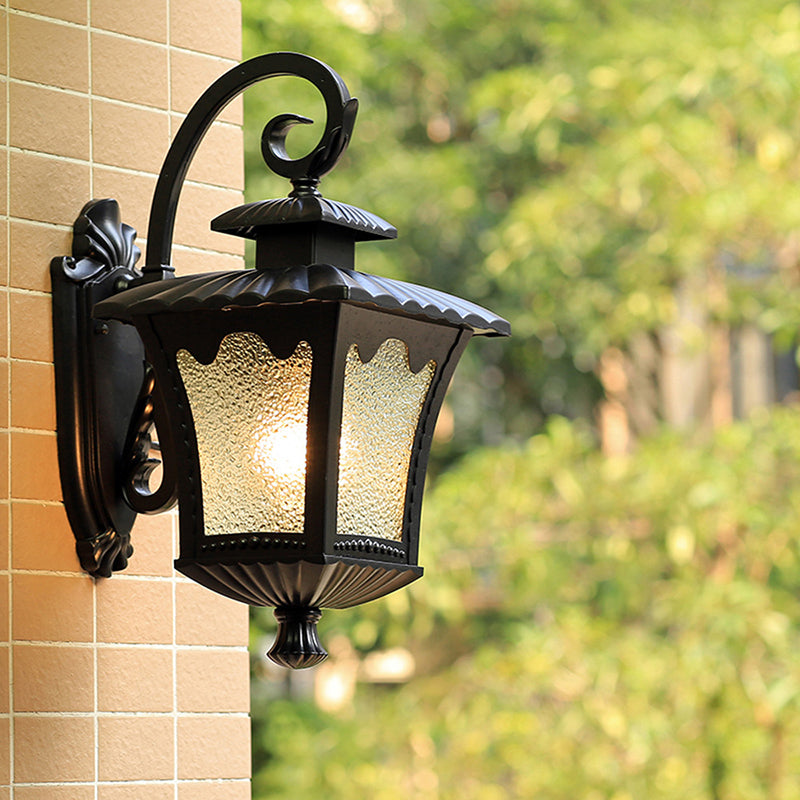 Modern Tetragonal Lotus Wall Sconce In Black Aluminum With Water Glass Shade