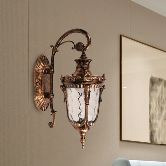 Acorn Glass Wall Sconce With Clear Water In Brass Finish