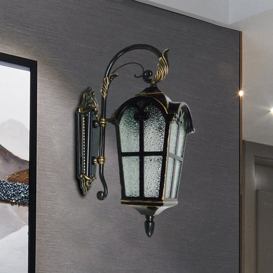 Farmhouse Wall Sconce: 1-Light Curving Arm Metallic Lamp In Black With Water Glass Shade