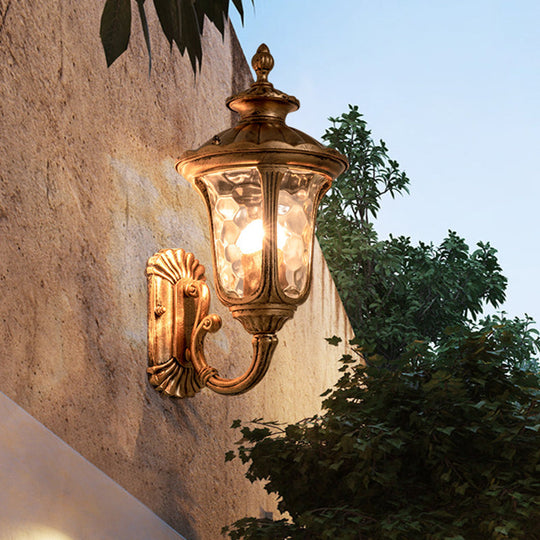 Rustic Brass Wall Mounted Sconce With Water Glass Acorn Design - 1 Bulb Light Fixture