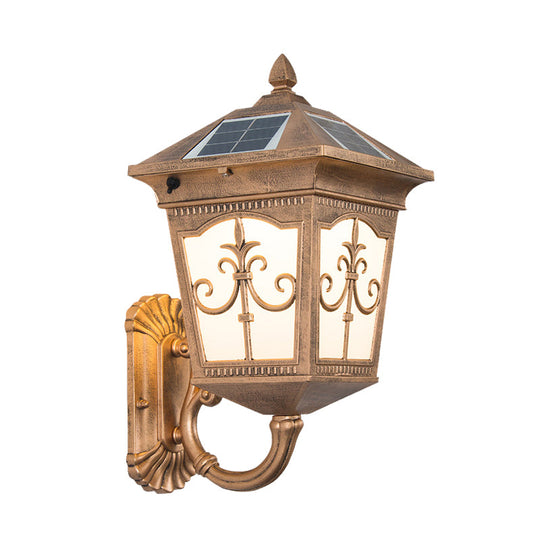 Quartet Religion Wall Lamp: Rustic 1-Light Sconce With Solar Panel Brass Finish