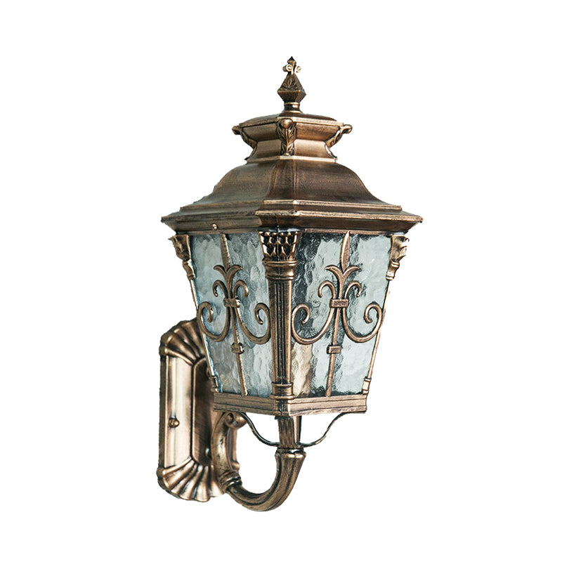 Country Brass Outdoor Wall Sconce With Pointed Flower Design