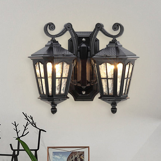 Geometric Outdoor Wall Light With Water Glass And Double Swirl Arm In Black Finish