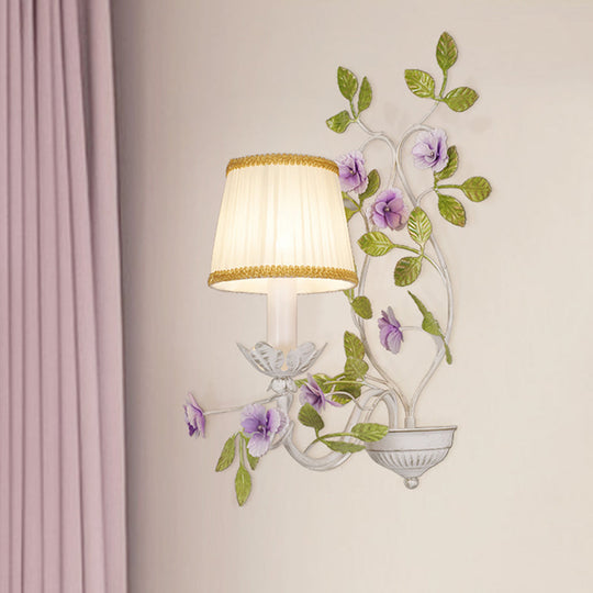 White Wall Sconce With Purple Flower Design And Pleated Shade For Bedroom Decor