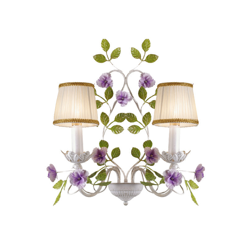 White Wall Sconce With Purple Flower Design And Pleated Shade For Bedroom Decor