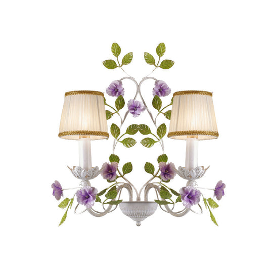 White Wall Sconce With Purple Flower Design And Pleated Shade For Bedroom Decor