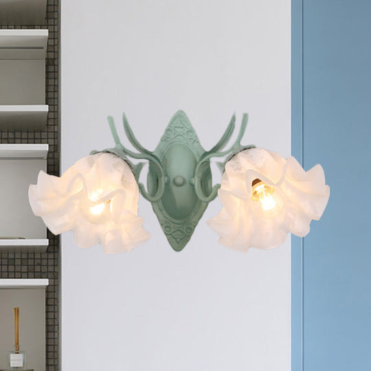 Pastoral White Glass Wall Sconce Lamp With Green Scalloped Design - 2 Bulb Lighting Fixture For