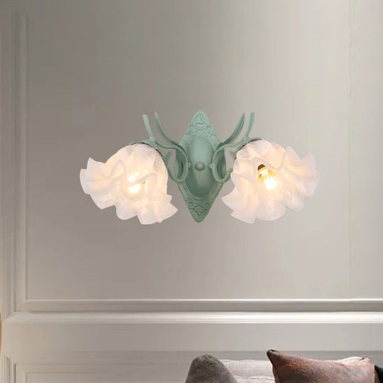 Pastoral White Glass Wall Sconce Lamp With Green Scalloped Design - 2 Bulb Lighting Fixture For