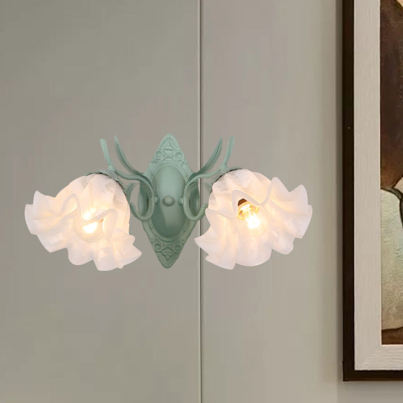 Pastoral White Glass Wall Sconce Lamp With Green Scalloped Design - 2 Bulb Lighting Fixture For