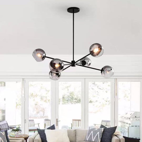 Minimalist Smoke Gray Glass Ball Chandelier With 6-Bulb Sputnik Pendant Lamp In Black Finish