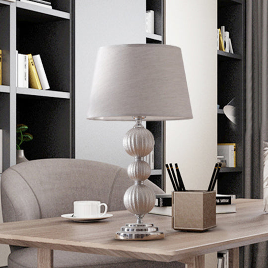 Minimal Silver Bedside Lamp With Ceramic Base And Fabric Shade