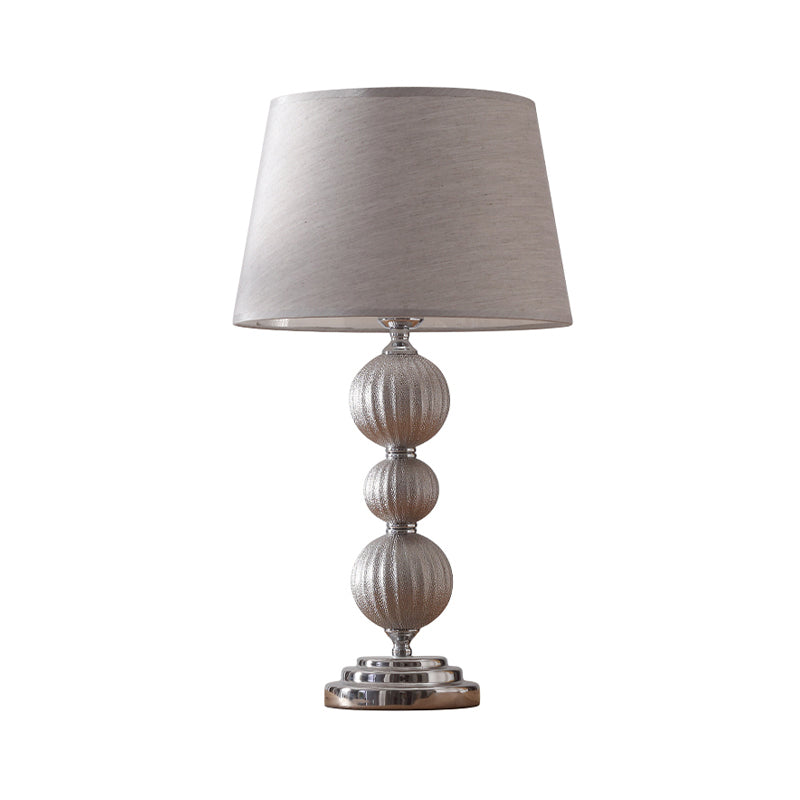 Minimal Silver Bedside Lamp With Ceramic Base And Fabric Shade