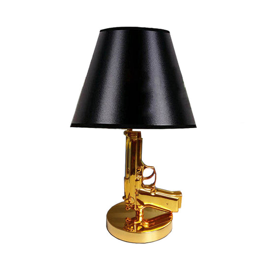 Modernist Black Barrel Shade Table Light With Gold Gun-Shaped Body - 1-Head Fabric Desk Lamp