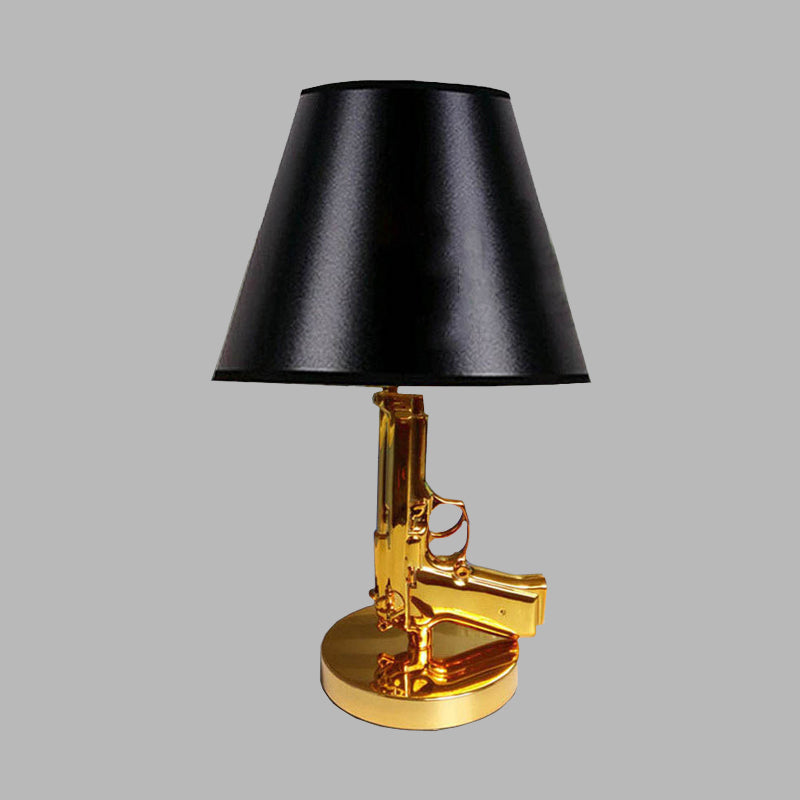 Modernist Black Barrel Shade Table Light With Gold Gun-Shaped Body - 1-Head Fabric Desk Lamp