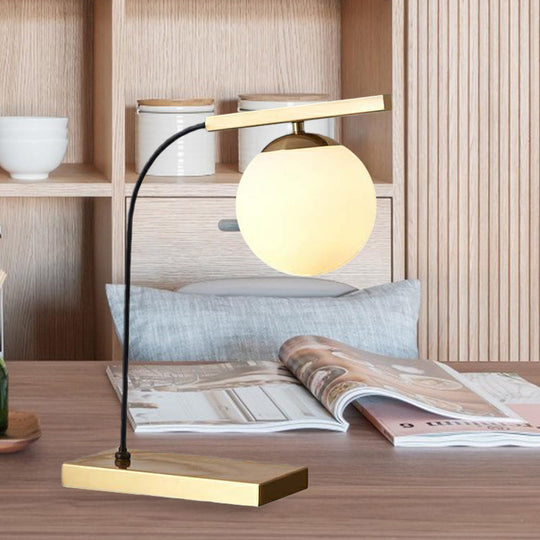 Modern Gold Linear Table Light With Milk Glass Ball Shade