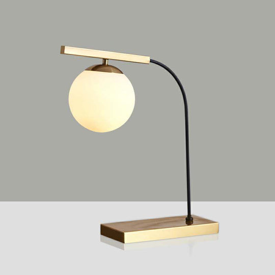 Modern Gold Linear Table Light With Milk Glass Ball Shade