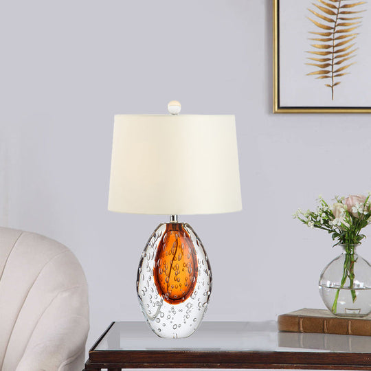 Oval Desk Lamp With Clear Bubble Glass Ideal For Bedroom Or Night Table Modern Design In White