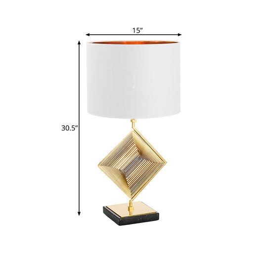 Modern Gold Metal Pyramid Bedside Lamp With White Fabric Shade