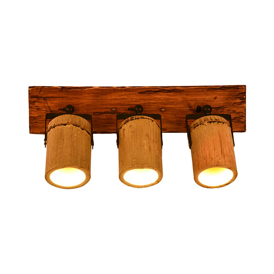 Rustic Bamboo Wall Sconce With Linear Wood Backplate