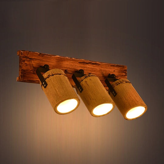 Rustic Bamboo Wall Sconce With Linear Wood Backplate