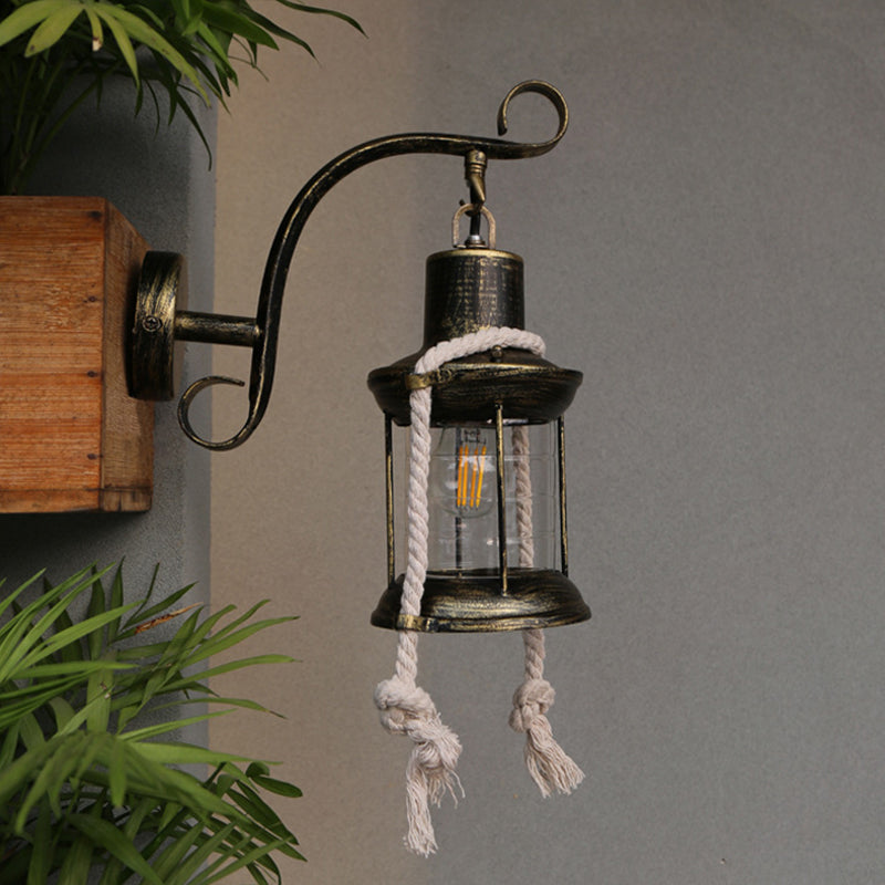 Industrial Brass/Copper Curved Arm Sconce With Clear Glass Shade